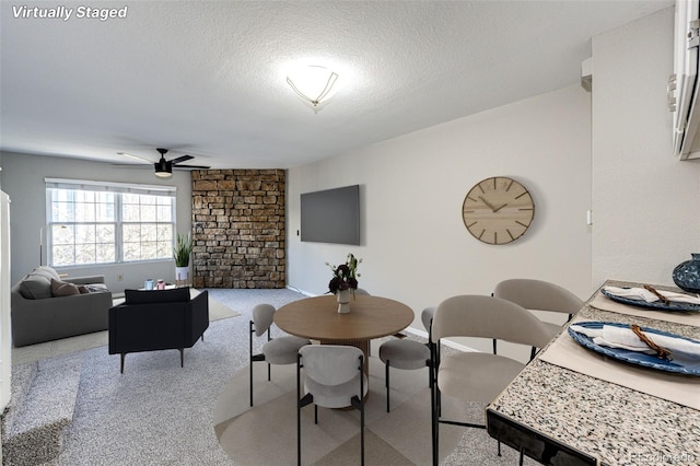 8231 S Fillmore Way, Centennial, CO 80122 - carpeted dining room featuring ceiling fan, a textured ceiling, and baseboards