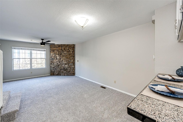 8231 S Fillmore Way, Centennial, CO 80122 - carpeted spare room with a ceiling fan, a textured ceiling, and baseboards