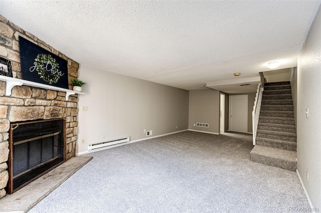 8231 S Fillmore Way, Centennial, CO 80122 - unfurnished living room featuring a baseboard heating unit, carpet floors, a textured ceiling, stairs, and a fireplace
