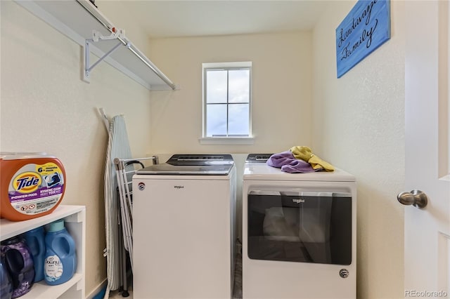 laundry area with laundry area and washer and dryer