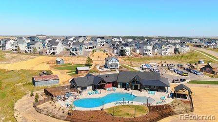 view of pool featuring a residential view