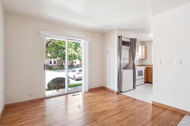 4656 S Dillon Ct Unit D, Aurora, CO 80015 - unfurnished room featuring light wood-type flooring and baseboards