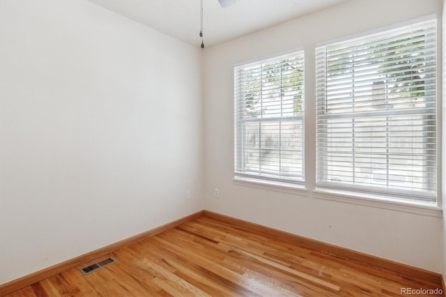 4656 S Dillon Ct Unit D, Aurora, CO 80015 - empty room with light wood-style flooring and a ceiling fan