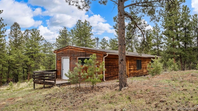 3763 County Road 43, Bailey, CO 80421 - view of property exterior with a wooden deck