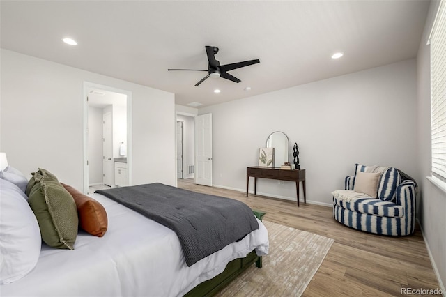 7202 S Valleyhead Ct, Aurora, CO 80016 - bedroom with wood finished floors, recessed lighting, a ceiling fan, baseboards, and ensuite bathroom