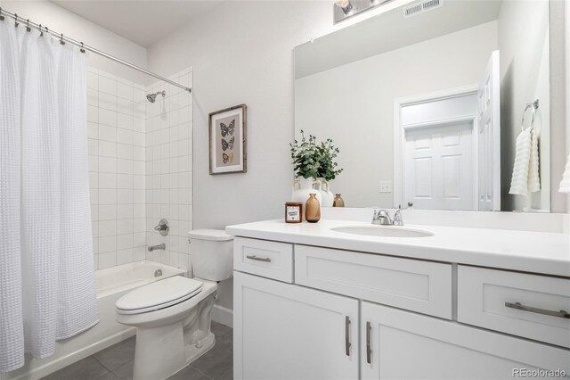 7202 S Valleyhead Ct, Aurora, CO 80016 - full bath with toilet, tile patterned floors, shower / bathtub combination with curtain, and vanity
