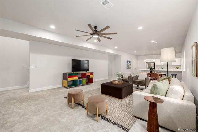 7202 S Valleyhead Ct, Aurora, CO 80016 - living area featuring recessed lighting, a ceiling fan, baseboards, and light carpet
