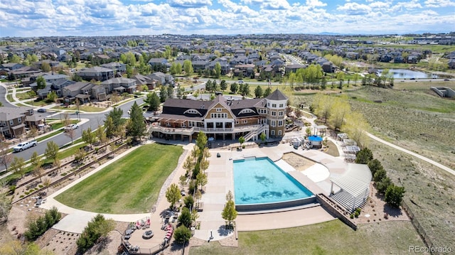 7202 S Valleyhead Ct, Aurora, CO 80016 - aerial view of residential area with a pool area and a large body of water