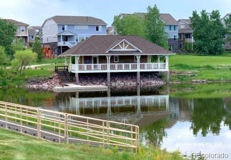 7202 S Valleyhead Ct, Aurora, CO 80016 - dock area featuring a water view and a residential view