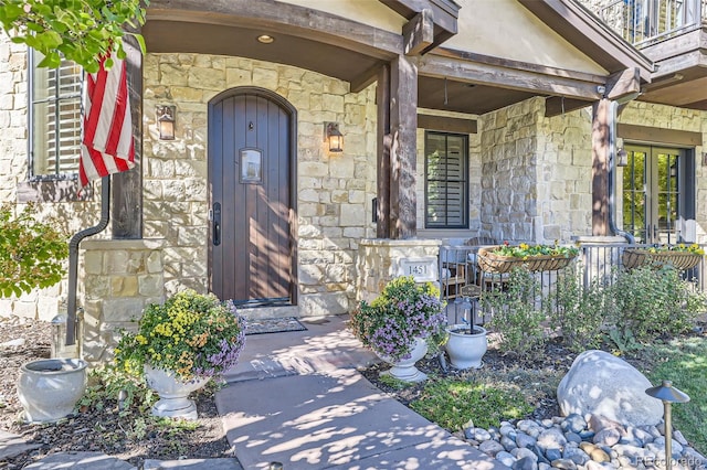 entrance to property with covered porch