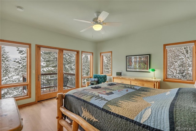 bedroom with access to outside, light wood-style flooring, and ceiling fan