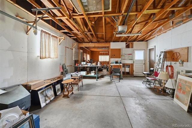 below grade area with a garage and a workshop area