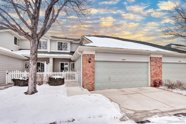 view of front of property with a garage