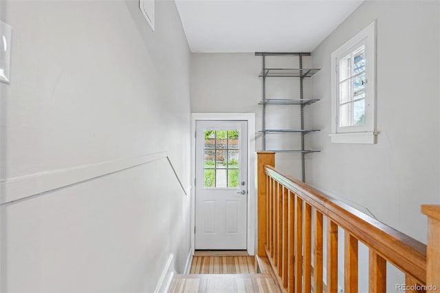 doorway to outside featuring wood finished floors