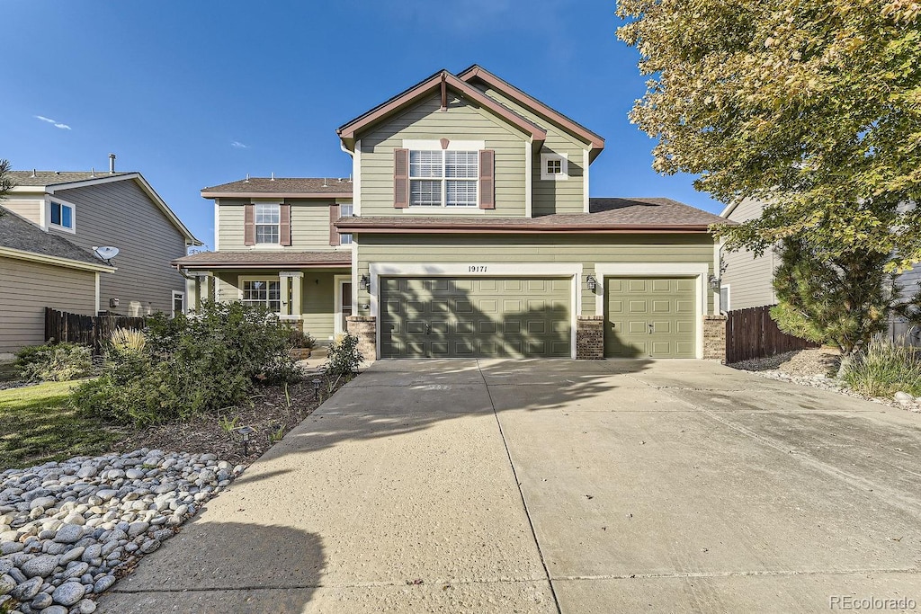 front of property with a garage