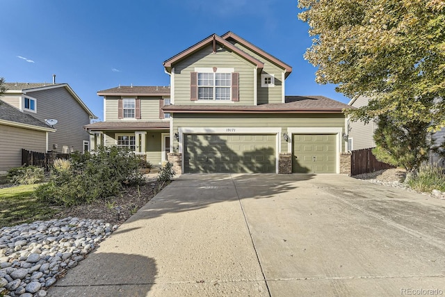 front of property with a garage