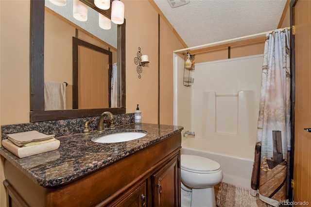 full bathroom with vanity, toilet, shower / tub combo, and a textured ceiling