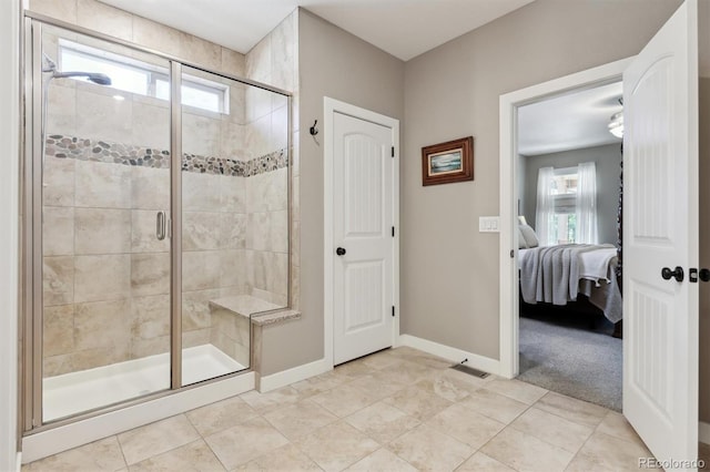 4077 Forever Cir, Castle Rock, CO 80109 - ensuite bathroom with ensuite bathroom, a stall shower, and a wealth of natural light