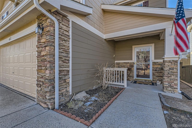 property entrance with stone siding