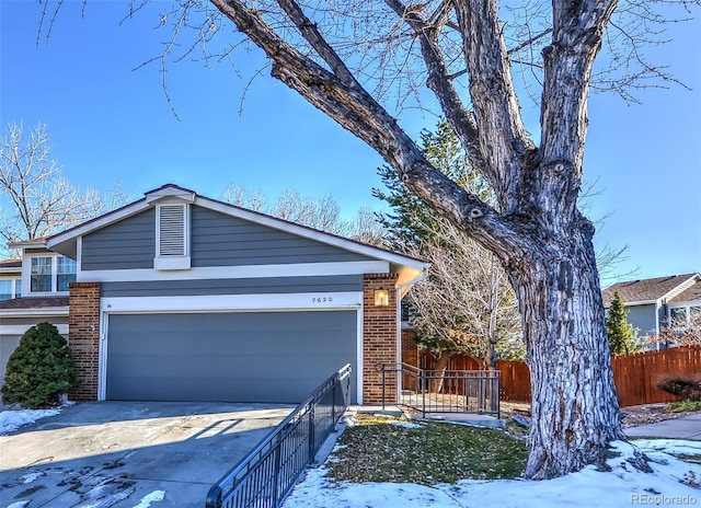 ranch-style home featuring a garage