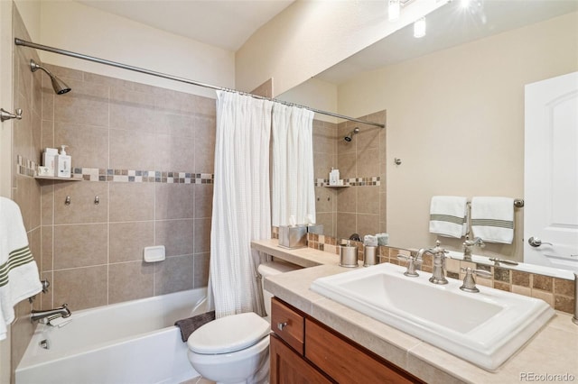 full bathroom featuring vanity, toilet, and shower / tub combo with curtain