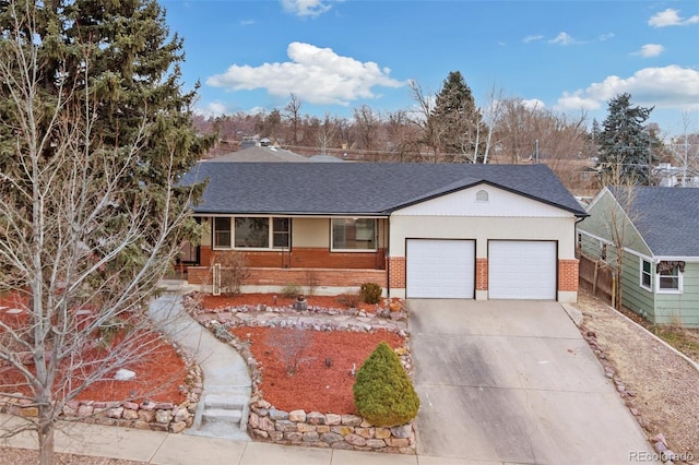 single story home featuring driveway, roof with shingles, an attached garage, fence, and brick siding