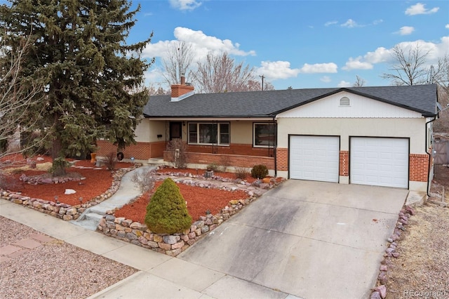 ranch-style home with a garage, brick siding, concrete driveway, roof with shingles, and a chimney