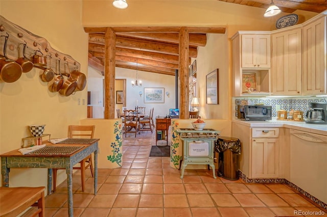 kitchen with hanging light fixtures, backsplash, vaulted ceiling with beams, white dishwasher, and light tile patterned flooring