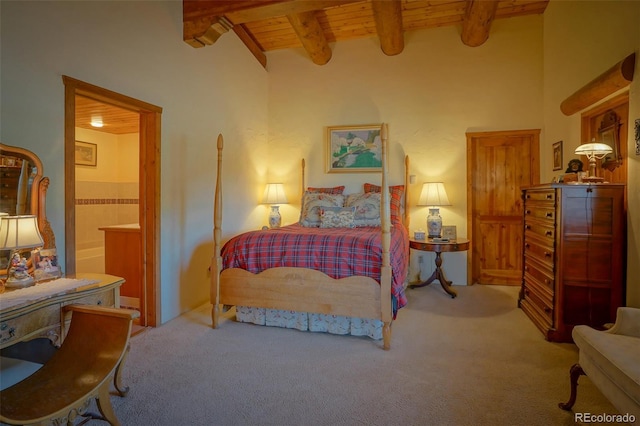 bedroom featuring carpet, wooden ceiling, and beam ceiling