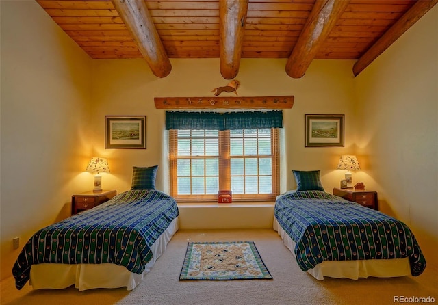 bedroom featuring carpet floors, wooden ceiling, and beamed ceiling