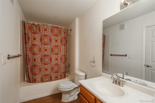 8775 W Berry Ave Unit 101, Littleton, CO 80123 - bathroom featuring shower / bath combination with curtain, toilet, vanity, and visible vents