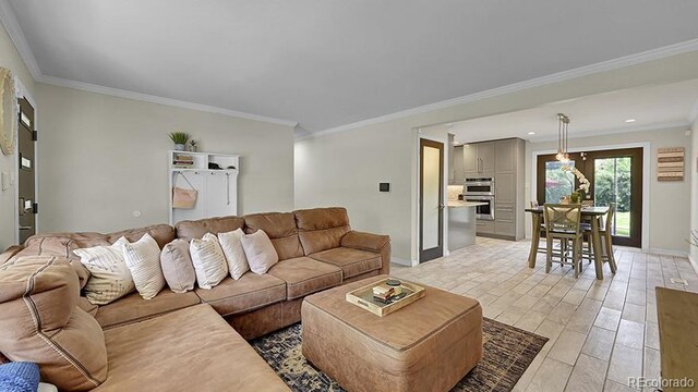 12020 W Alabama Pl, Lakewood, CO 80228 - living room featuring ornamental molding, light wood-style flooring, and recessed lighting