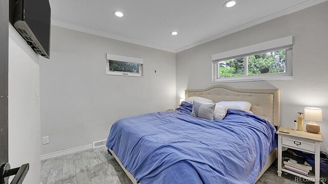 12020 W Alabama Pl, Lakewood, CO 80228 - bedroom with wood finished floors, recessed lighting, and ornamental molding