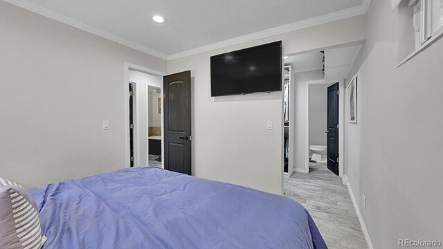 12020 W Alabama Pl, Lakewood, CO 80228 - bedroom featuring light wood-style flooring, recessed lighting, ornamental molding, and connected bathroom