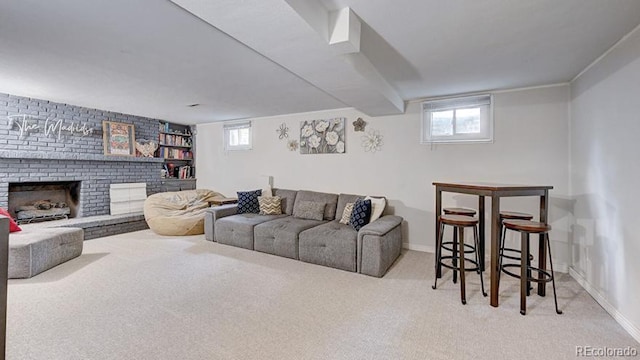 12020 W Alabama Pl, Lakewood, CO 80228 - carpeted living room featuring a brick fireplace and plenty of natural light