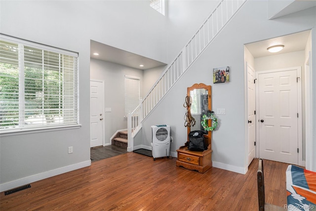 1201 102nd Ave, Greeley, CO 80634 - entryway featuring stairway and wood finished floors