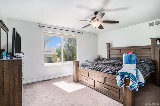 1201 102nd Ave, Greeley, CO 80634 - carpeted bedroom with baseboards and ceiling fan
