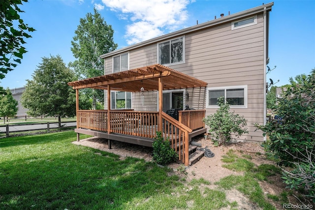 1201 102nd Ave, Greeley, CO 80634 - back of house featuring a pergola, a lawn, and a deck