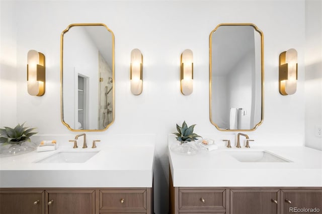 bathroom featuring two vanities and a sink