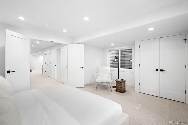 bedroom featuring recessed lighting, baseboards, and light carpet