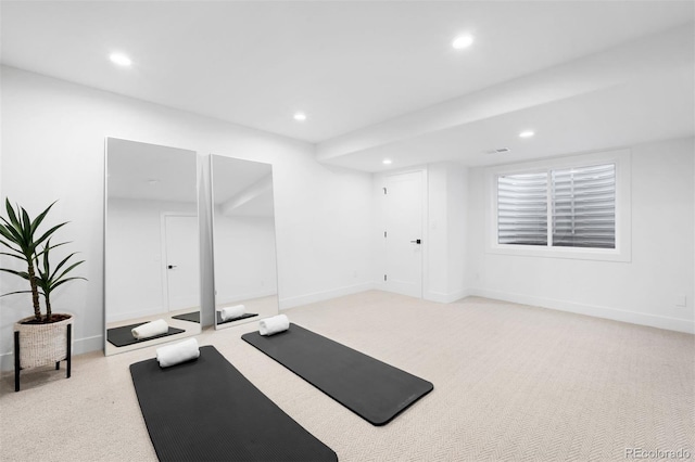 exercise area featuring carpet flooring, recessed lighting, and baseboards