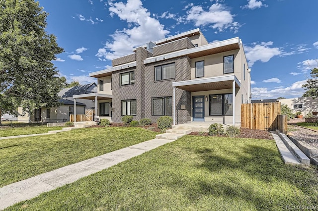 view of front of home with a front yard