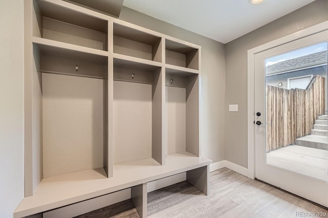 mudroom with light hardwood / wood-style flooring