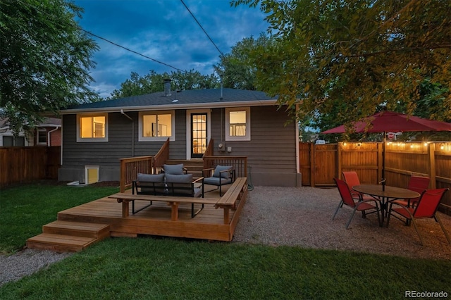 1895 S Emerson St, Denver, CO 80210 - rear view of house featuring a fenced backyard and a wooden deck