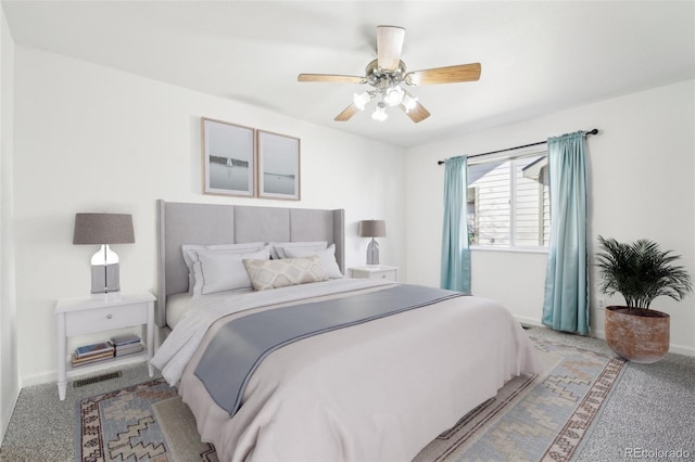 carpeted bedroom featuring ceiling fan