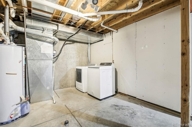 basement with separate washer and dryer and gas water heater