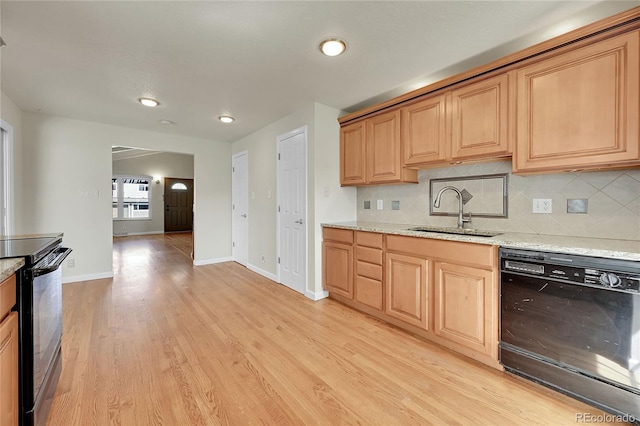 7240 S Cherry Dr, Centennial, CO 80122 - kitchen featuring light wood-style flooring, a sink, baseboards, black appliances, and tasteful backsplash