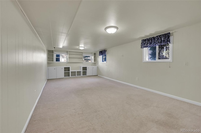7240 S Cherry Dr, Centennial, CO 80122 - below grade area featuring wooden walls, baseboards, and carpet flooring