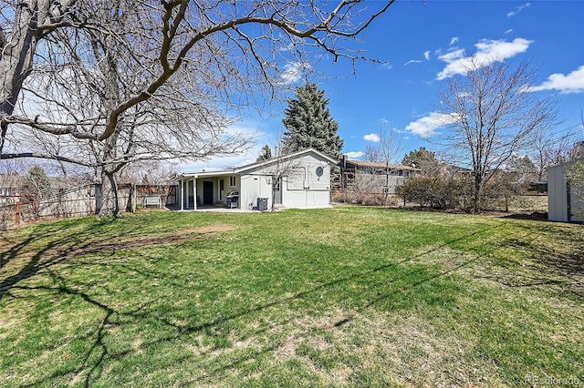 7240 S Cherry Dr, Centennial, CO 80122 - view of yard with a patio area and fence