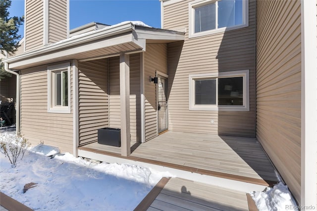 view of snow covered deck